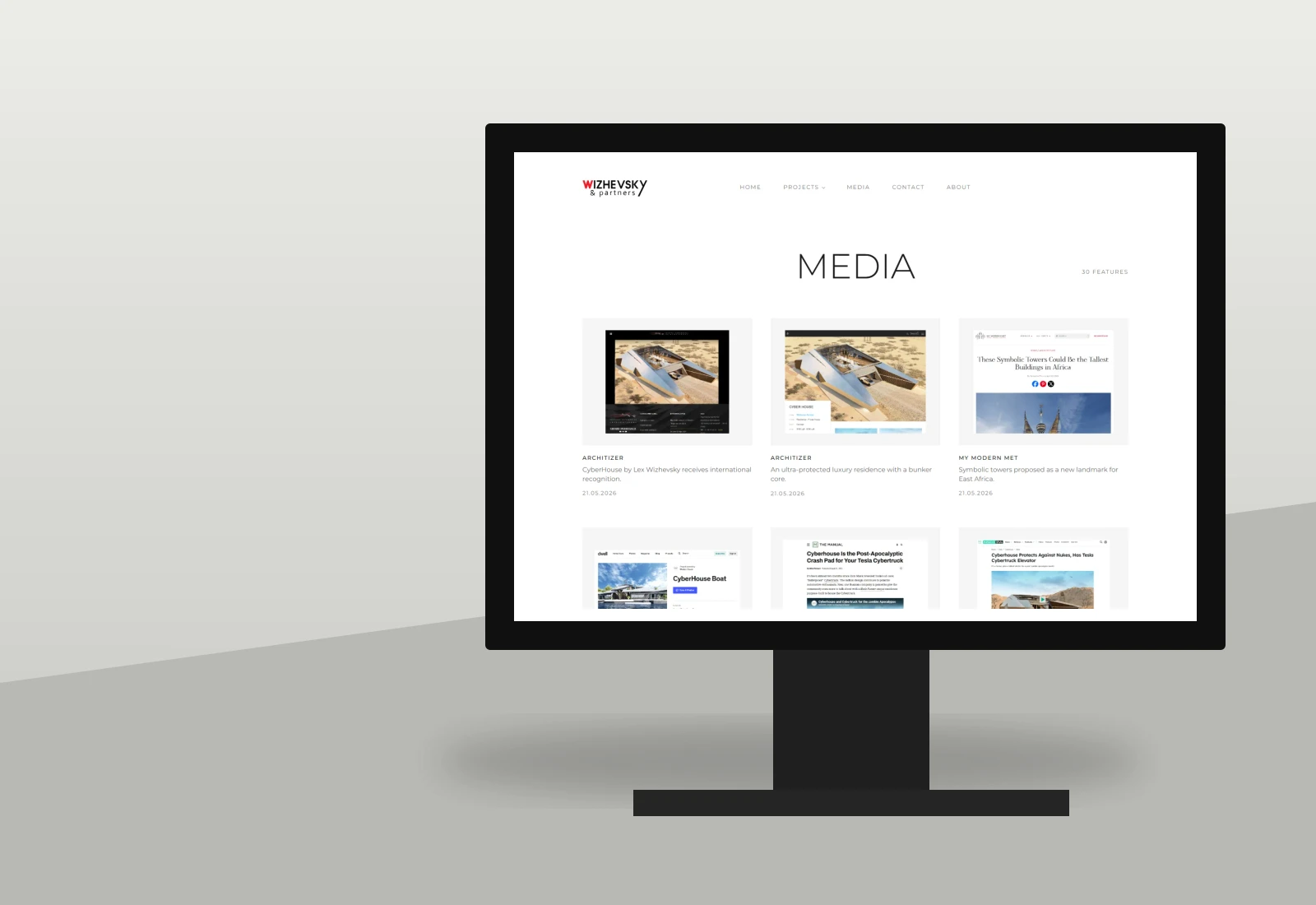 Wizhevsky media page on an architectural display
